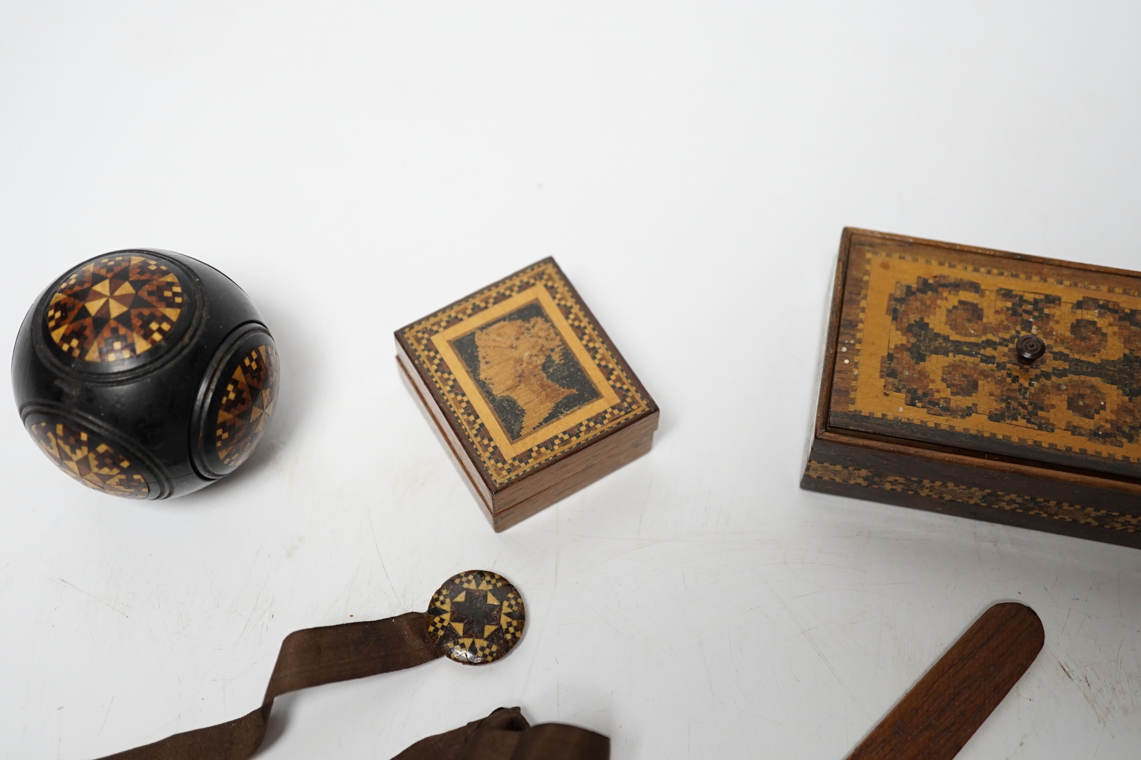 Tunbridgeware - six items including a stickware sovereign case, Victoria profile stamp box, two bookmarks, nib pen, and a small box and cover